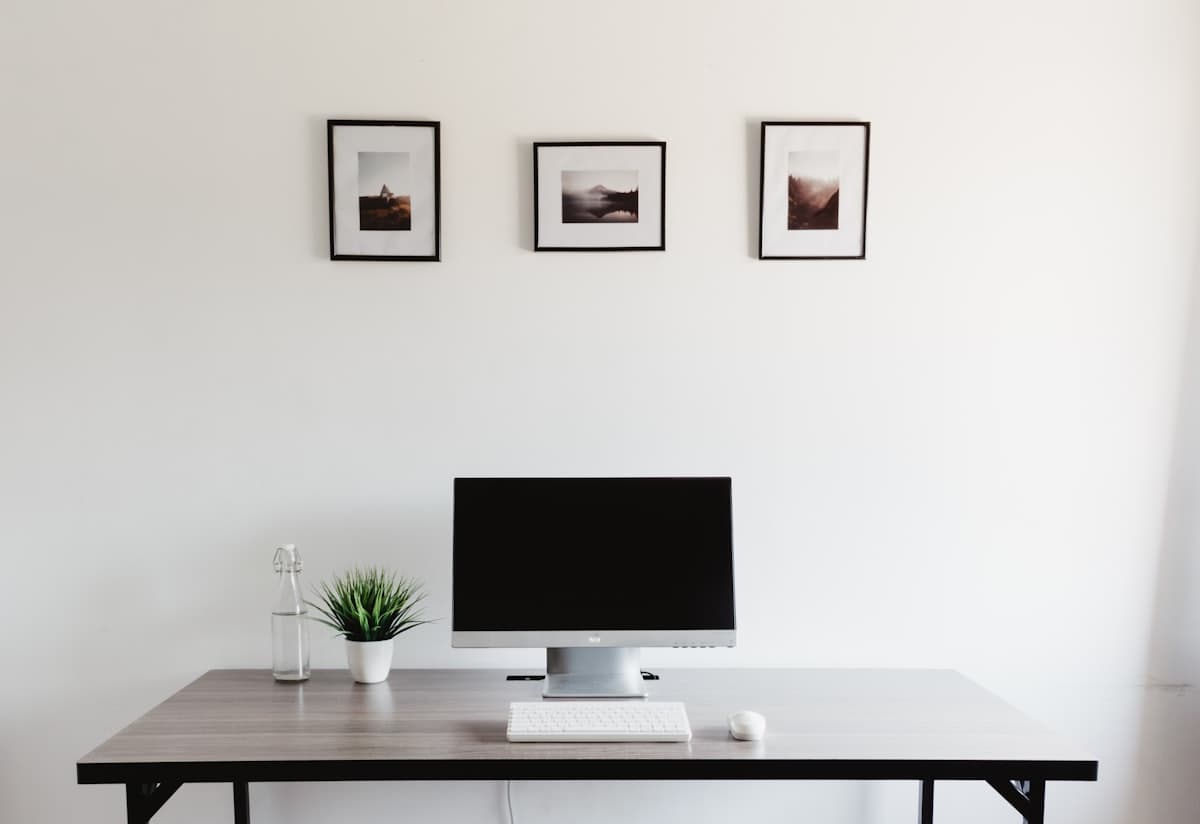 An open-plan office with people working at their desks